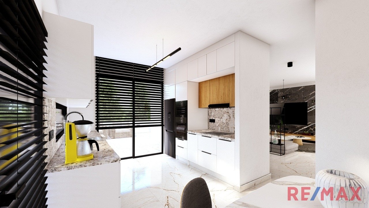 Küche (Blick zum Wohnzimmer + Eingangsbereich)